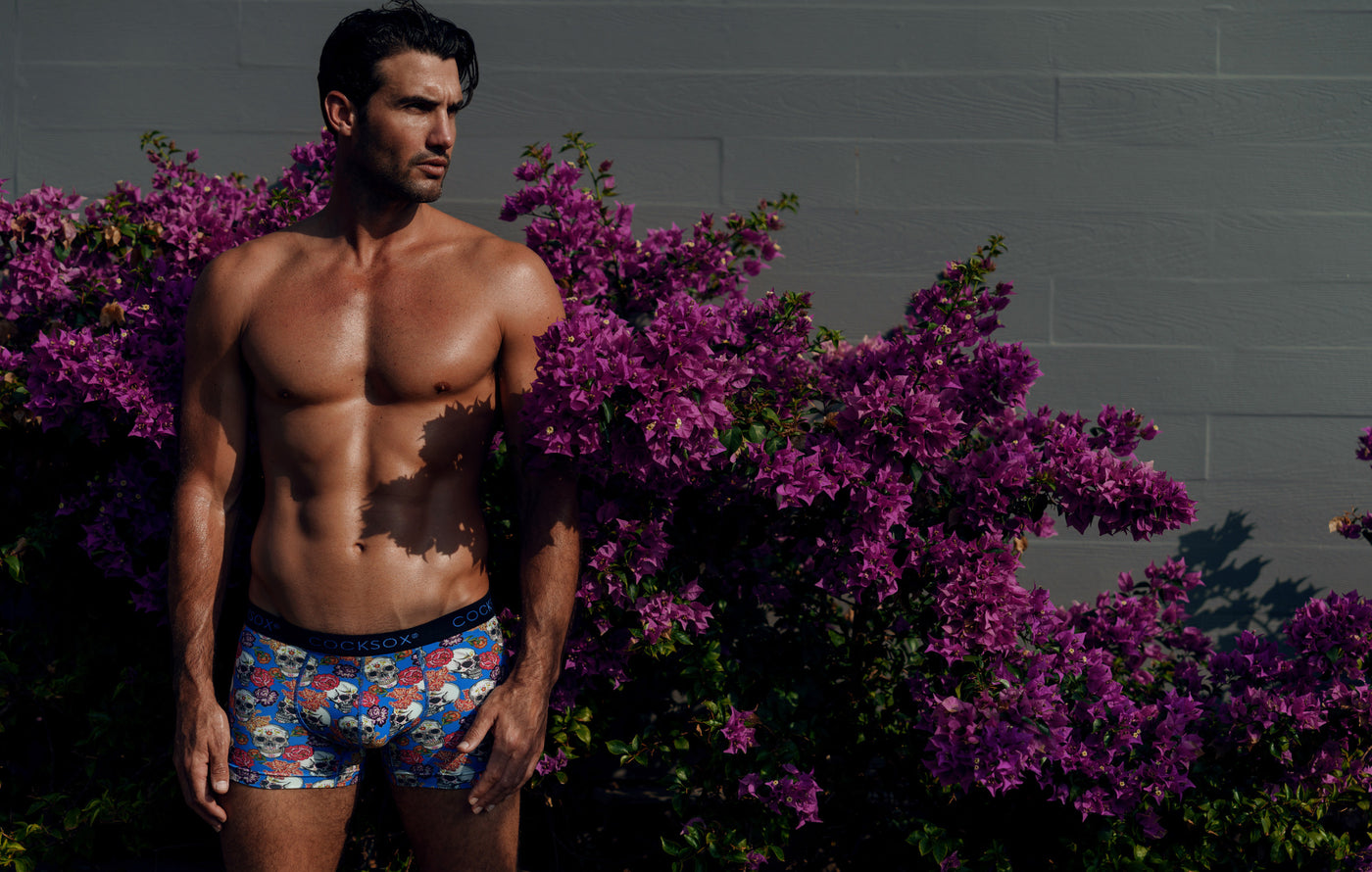Lifestyle editorial image featuring Cocksox CX12DD Day of the Dead Collection Men's underwear Boxer in Calavera Blue